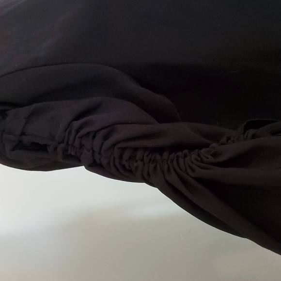 May May, black top with large, gathered sleeves. - Picture 2 of 7